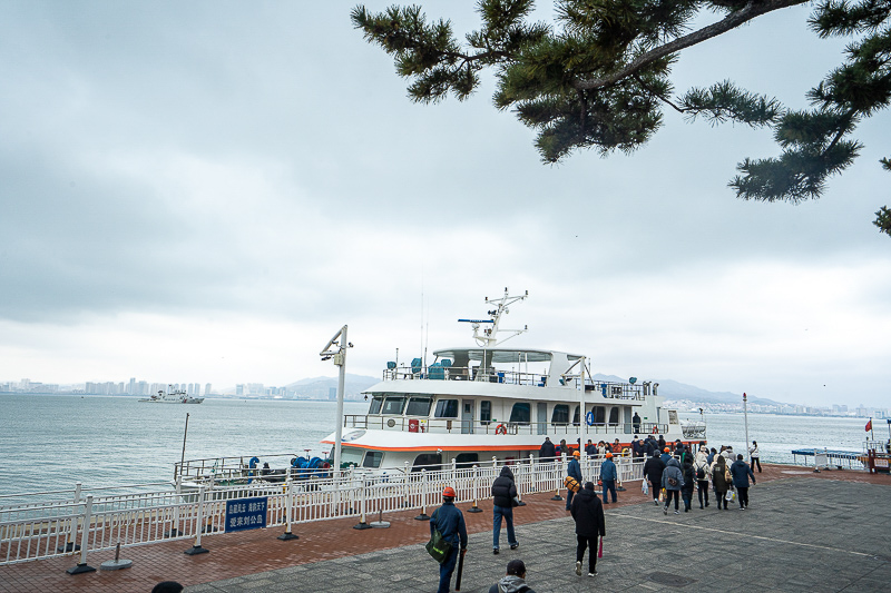 青岛胶东机场接机怎么订?举牌接机流程与价格